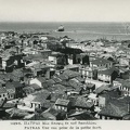 47. Άποψη της Πάτρας προς το λιμάνι. Στο κέντρο περίπου (τα μαύρα δέντρα) διακρίνεται η πλατεία Όλγας (φωτό από το Δασύλλιο), δεκαετία 1950