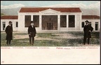 Γυμναστήριο Παναχαϊκού, 1904 (μόλις είχε κατασκευαστεί το υπόστεγο). Βρισκόταν στο οικόπεδο Γ. Ολυμπίου, Μεσολογγίου, Καποδιστρίου & Παναχαϊκού. Πουλήθηκε το 1955 για να κατασκευαστεί η κερκίδα στην Αγυιά